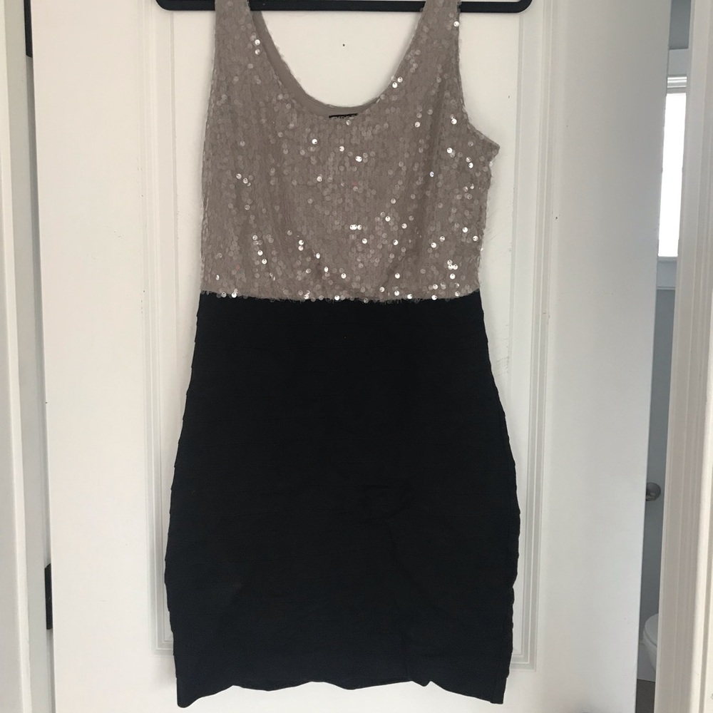 Sequin dress with stretchy bodycon bottom half